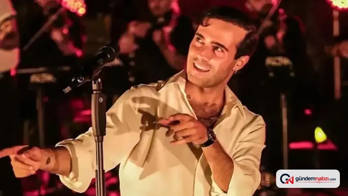 Mert Demir Harbiye konserinde bıyığını kesti