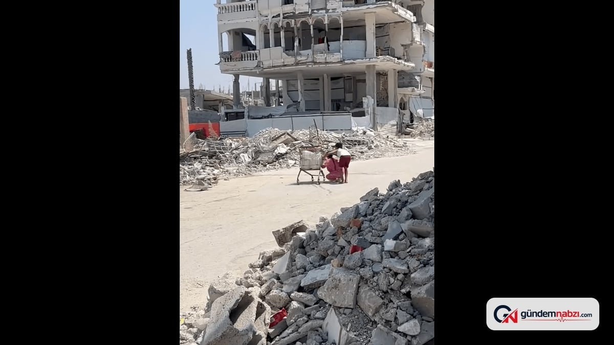 Gazze'de Çocuklar İsrail dronunun ateşinden alışveriş arabasına sığındı
